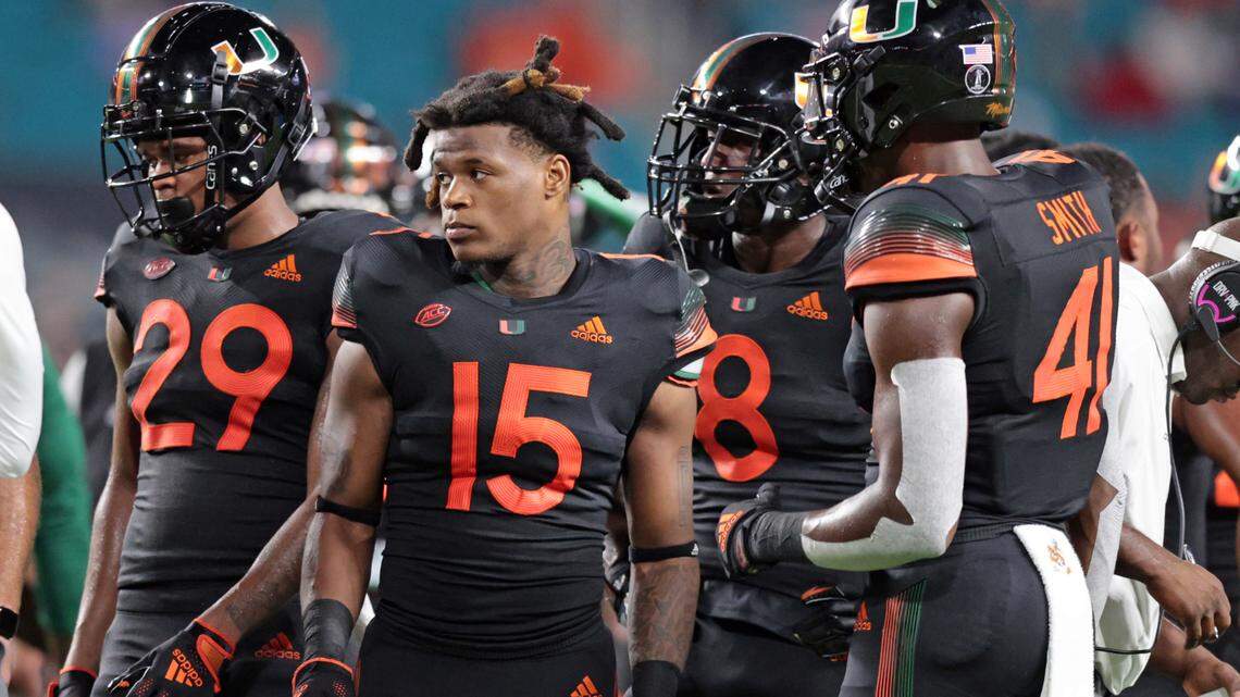 Miami Hurricanes safety Avantae Williams (15) joins teammates on the field during game against the North Carolina State Wolfpack at Hard Rock Stadium in Miami Gardens on Saturday, October 23, 2021.