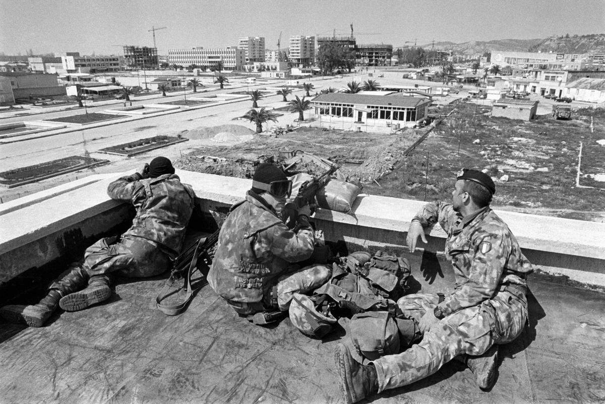 An Italian military unit — part of a United Nations peacekeeping mission to the country — keeps watch over Vlora in 1997.