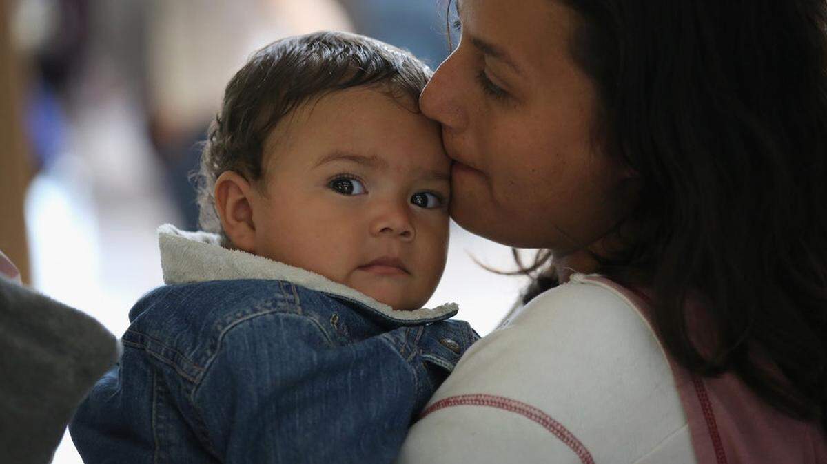 A woman and child at the U.S.-Mexico border, where children were separated from their parents trying to enter the United States illegally.