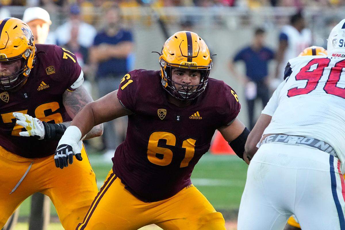 Arizona State offensive lineman Dohnovan West (61) in the first half during an NCAA college football game against Arizona, Saturday, Nov. 27, 2021, in Tempe, Ariz. (AP Photo/Rick Scuteri)