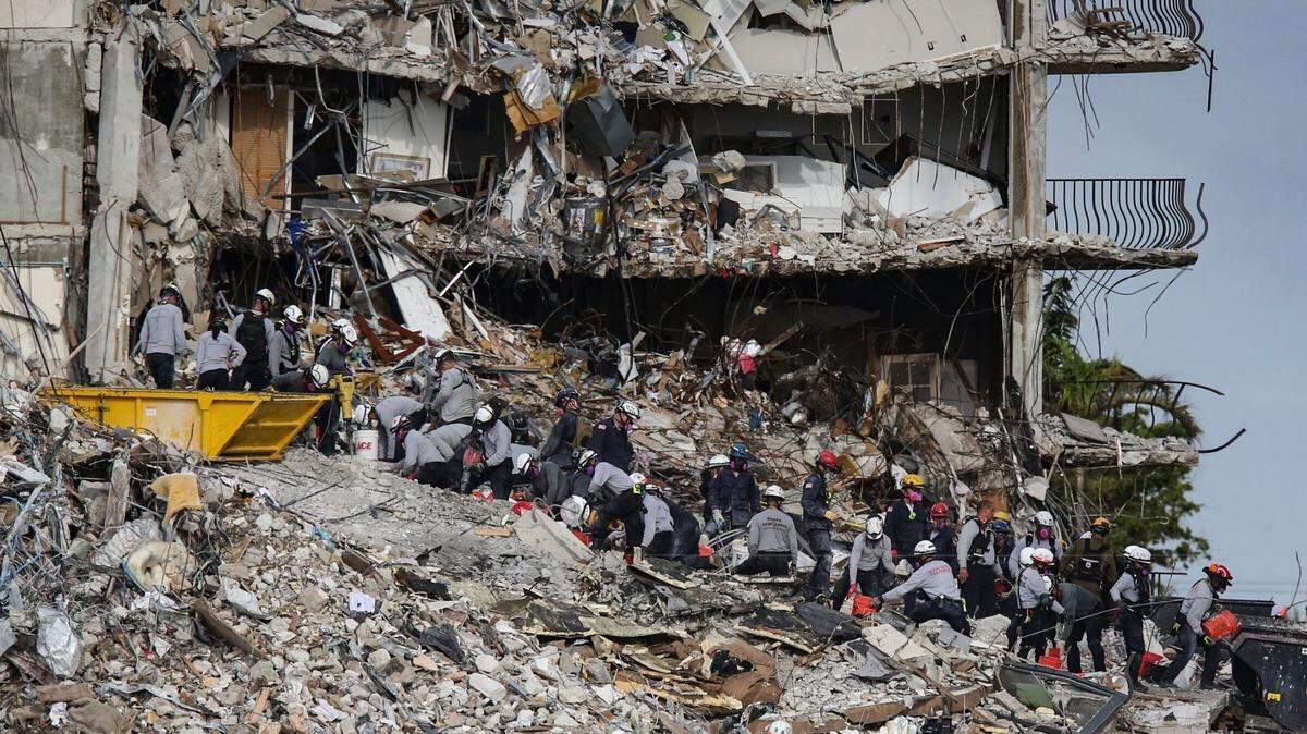 Search-and-rescue teams look for survivors at the Champlain Towers South residential condo in Surfside on June 29, 2021.
