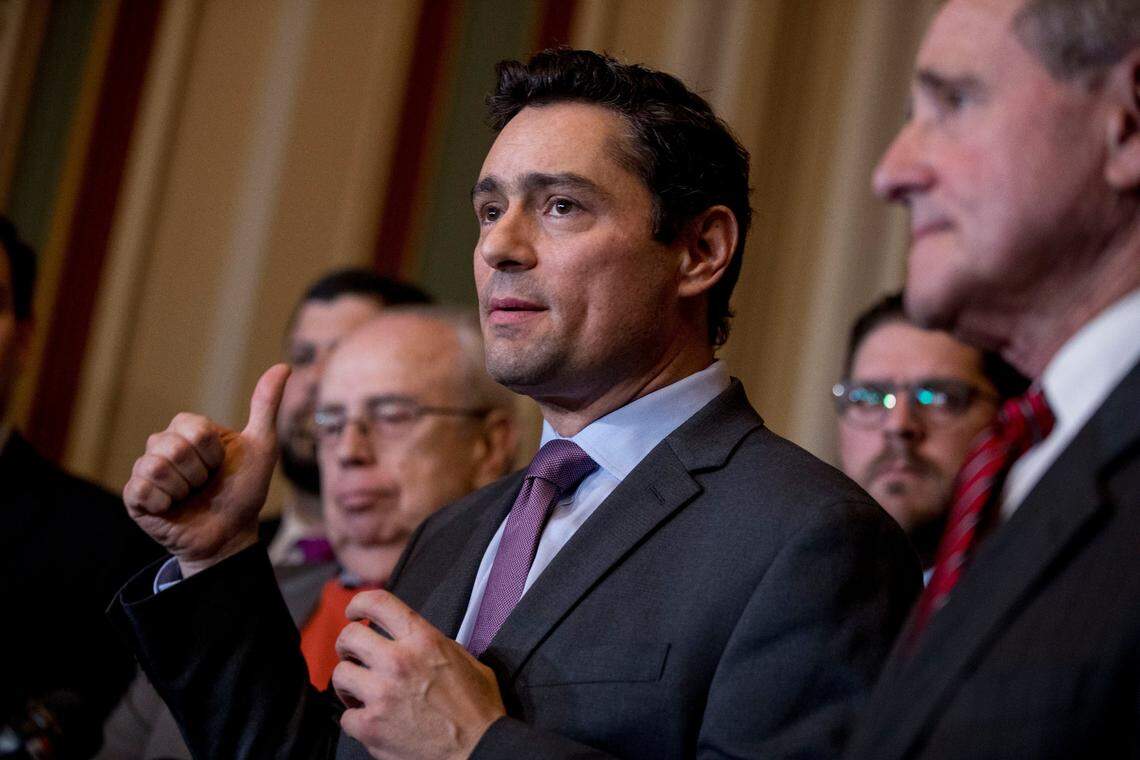 Venezuelan opposition’s new envoy in Washington, Carlos Vecchio, center, speaks at a news conference on Capitol Hill in Washington, D.C., Wednesday, Jan. 30, 2019.
