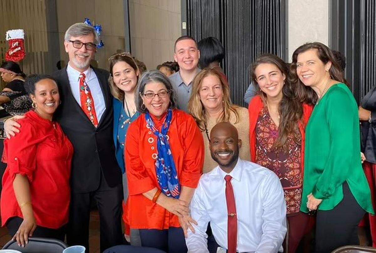 Sean McCrackine, second from left, poses with Miami-Dade County government staffers and Mayor Daniella Levine Cava.