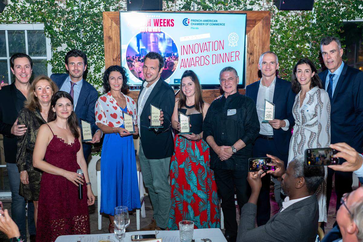 Winners of innovation awards and organizers of event.