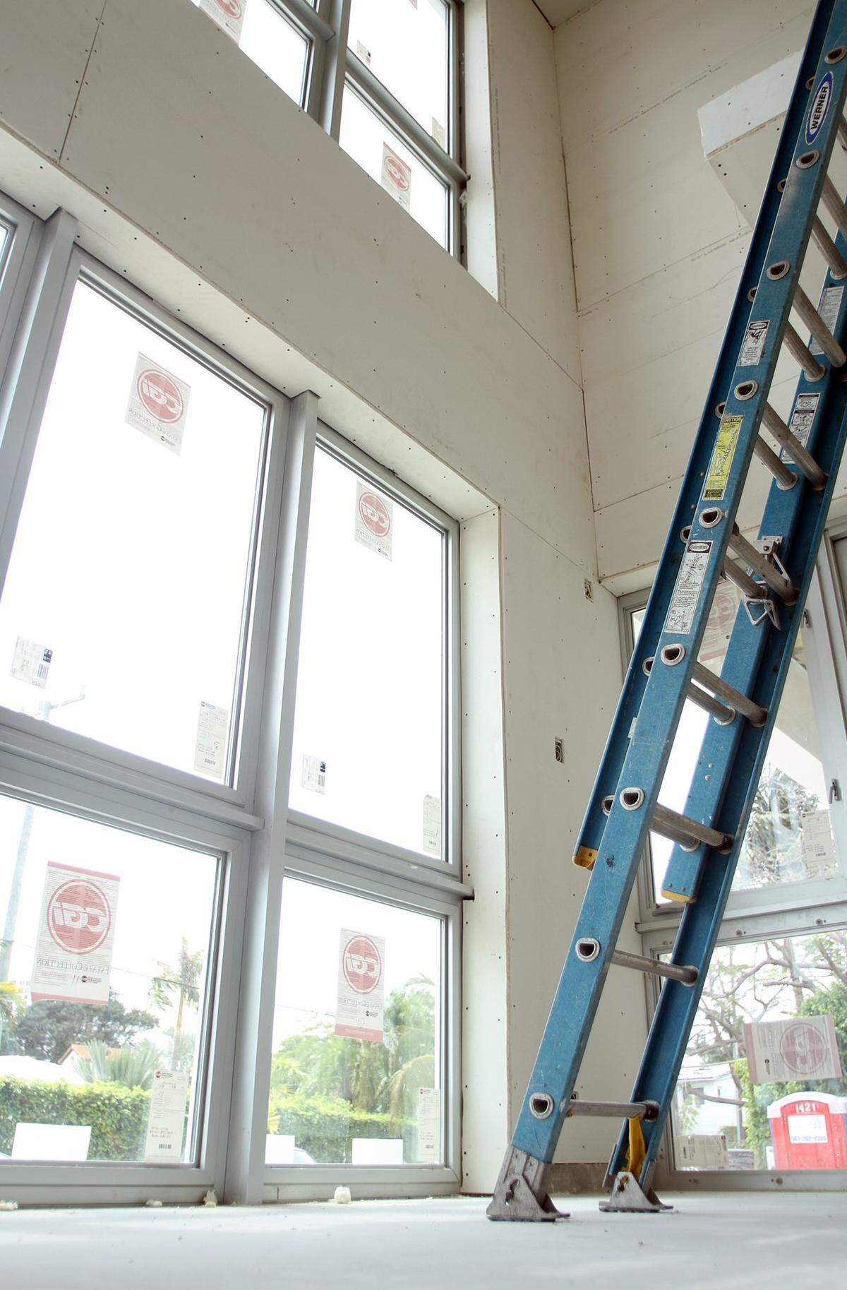 Double insulated and laminated windows help block solar heat in addition to cutting down street noise and hurricane protection in a Miami Beach home pursuing a LEED certification.