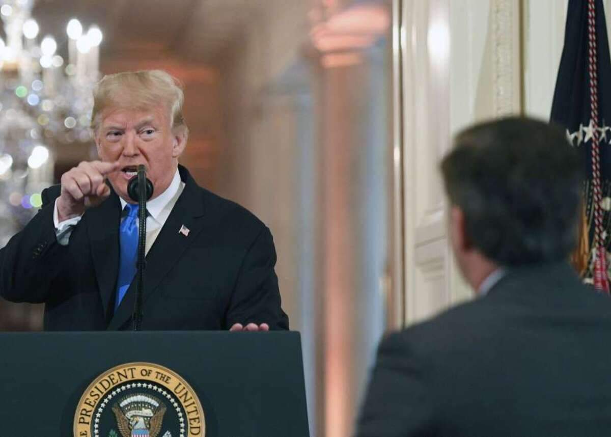 President Trump points at CNN reporter Jim Acosta during a post-election press conference.