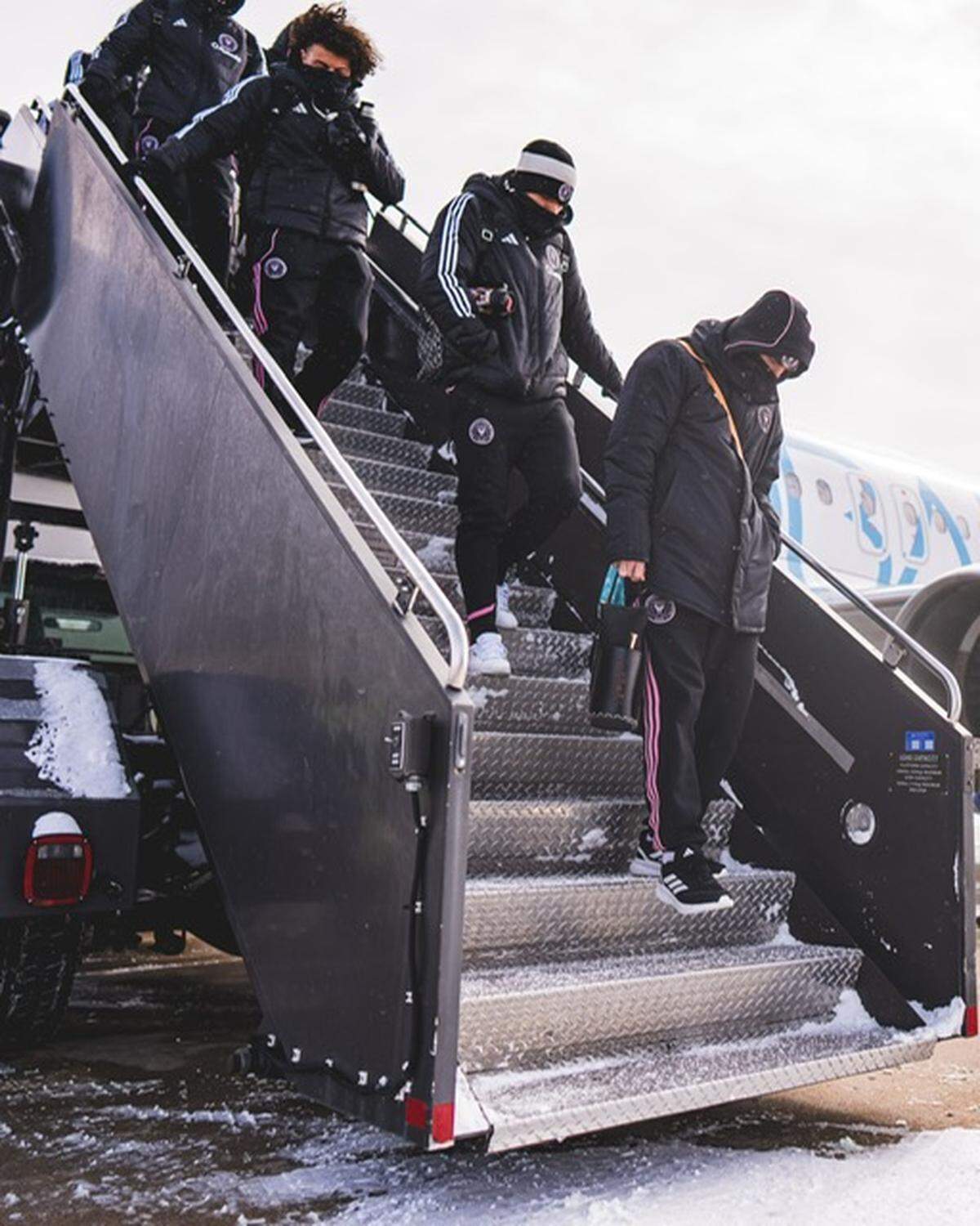 Inter Miami players arrive in Kansas City Wednesday bundled up for the frigid weather for the evening Concacaf Champions Cup opening match vs. Sporting KC.