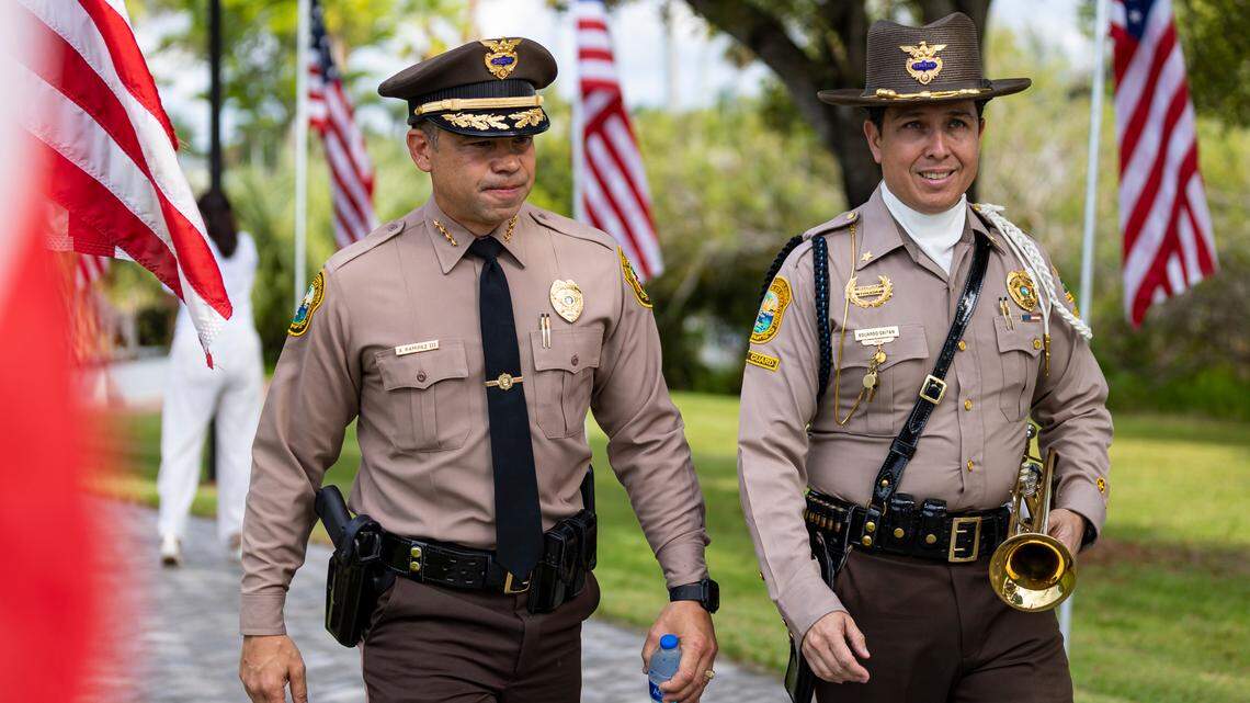 Miami-Dade Police Department Director Alfredo “Freddy” Ramirez III, left, at 9/11 remembrance ceremony at the Law Enforcement Officers Memorial in Tropical Park last year. 