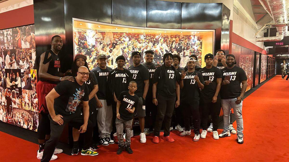 Miami Heat center Bam Adebayo (far left) held a meet and greet with high school students from Greensboro, North Carolina, on Wednesday, December 28, 2022, as part of a holiday trip to Miami that he arranged for them through his foundation.