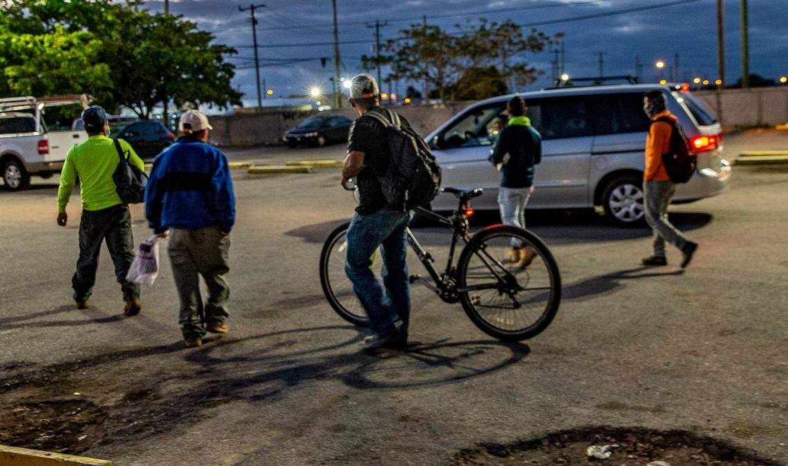Laborers gather during the early morning hours at different points around Homestead and Florida City, hoping to be hired to earn a salary as many are homeless after losing a steady income due to the COVID-19 pandemic on Wednesday, March 10, 2021.