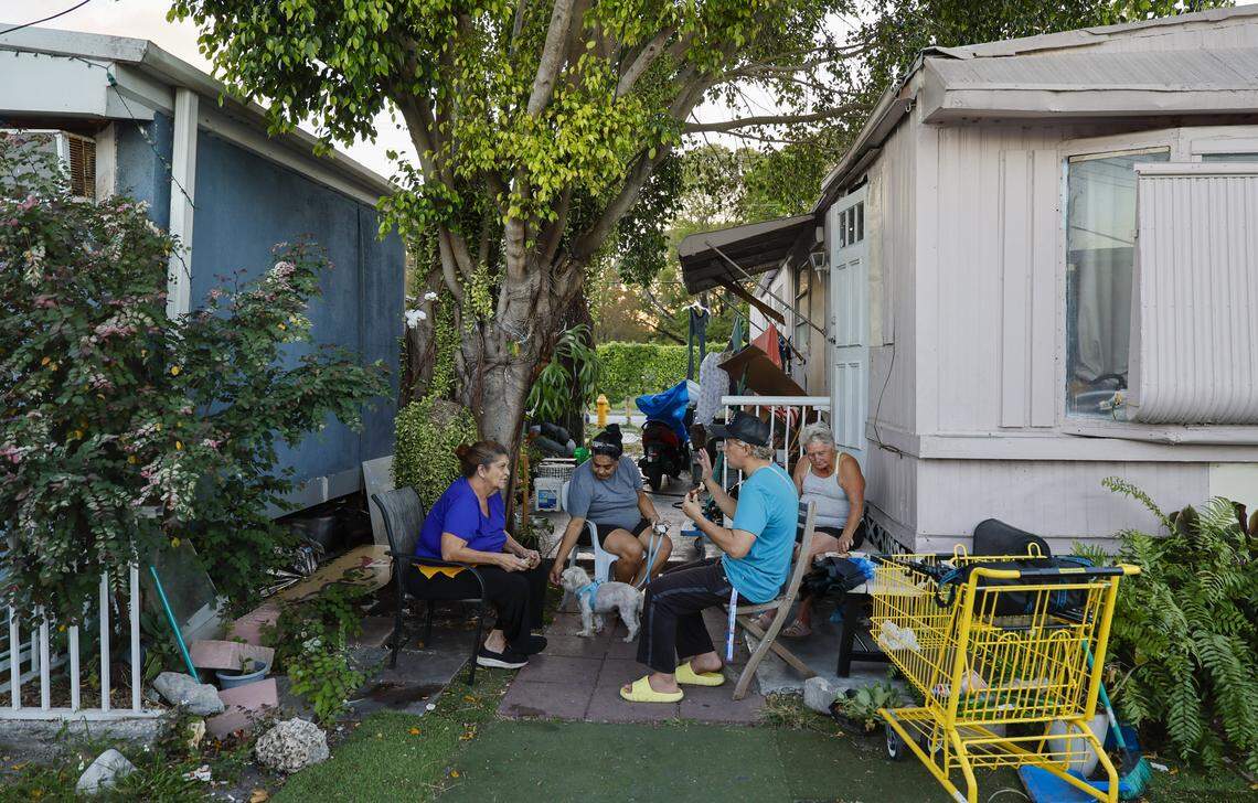 Residents, Victoria Diaz, Carmen di Pascuale, Joseph Madera and Reina Quintana, seen left to right, discuss their future at Silver Court Mobile Home Park. They are being evicted from their homes, raising concerns about displacement and the impact of their lives in Miami, Florida, on Friday, April 17, 2026. The trailer park is closing and 200 families are being evicted to make room for development.