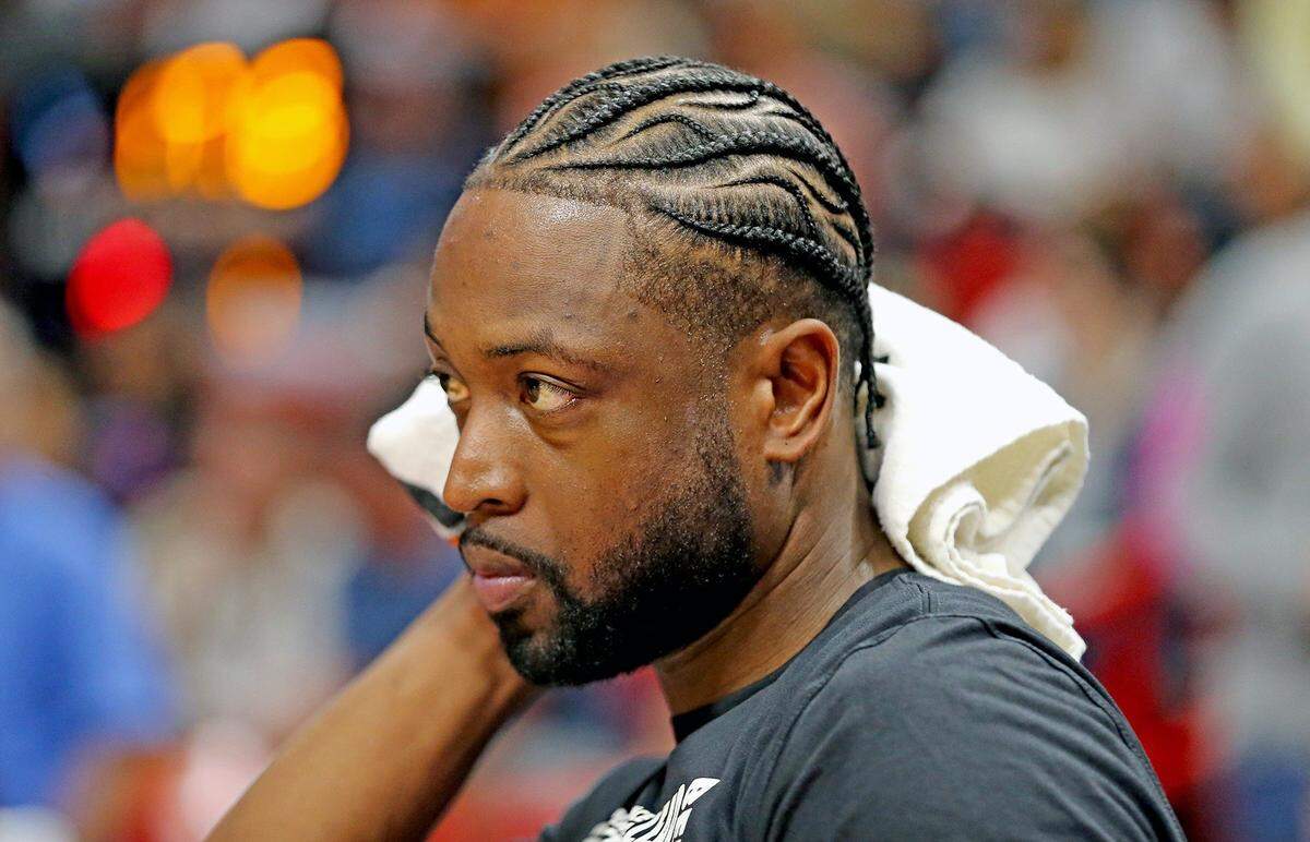 Miami Heat Dwyane Wade and new hair style as they play the Phoenix Suns at the AmericanAirlines Arena in Miami, Florida, Monday, February, 25, 2019.