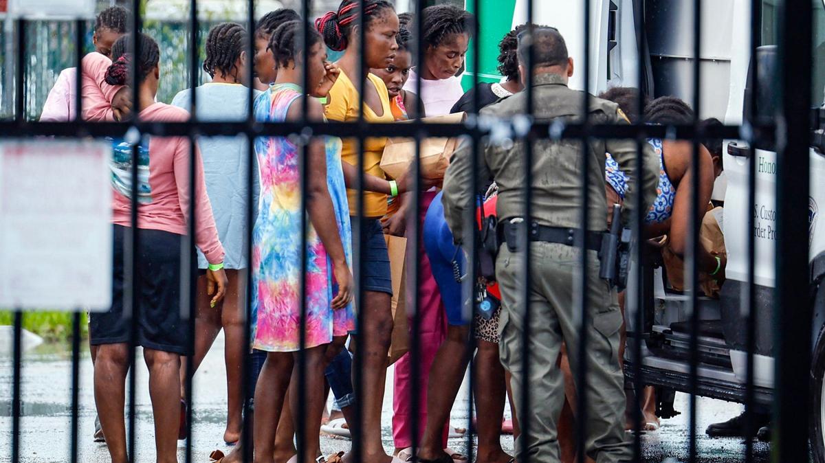 Haitian migrants prepare to depart the U.S. Customs and Border Protection station in the Middle Florida Keys city of Marathon on June, 2024. They were among a group of almost 120 people who arrived in Key West earlier in the morning on a migrant boat.