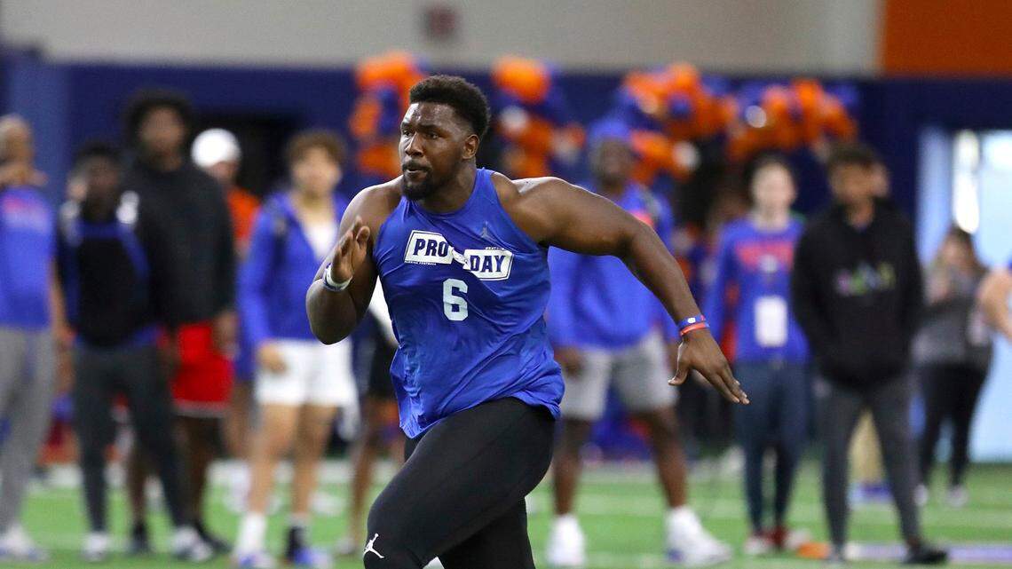 Florida defensive lineman Zachary Carter runs the 40-yard dash during the college football team’s Pro Day for NFL scouts in Gainesville, Fla., Monday, March 28, 2022. (Brad McClenny/The Gainesville Sun via AP)