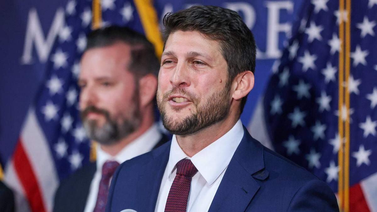 Florida Attorney General James Uthmeier, right, speaks alongside federal and state law enforcement officials during a press conference at the FDLE Miami Regional Operations Center on Thursday, Feb. 19, 2026, in Miami.