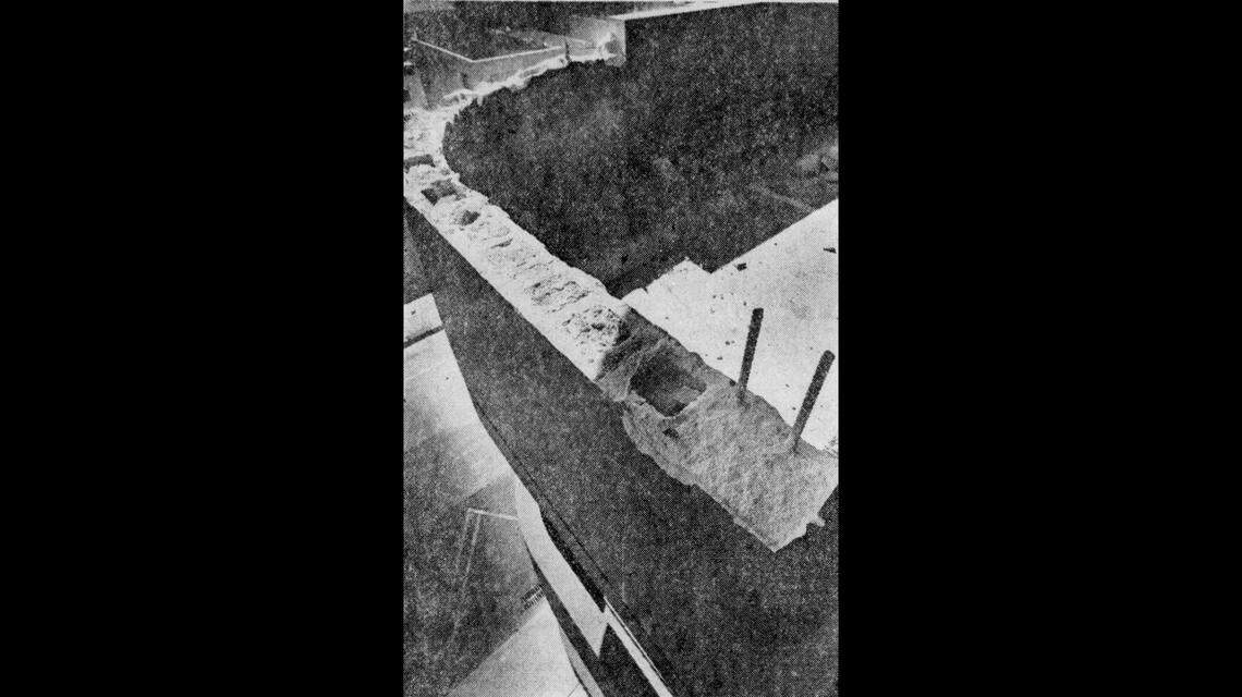 A ‘tie column’ on a parapet wall inside the Coral Gables Public Safety Building’s attached garage shows two strands of rebar where the plans called for four.