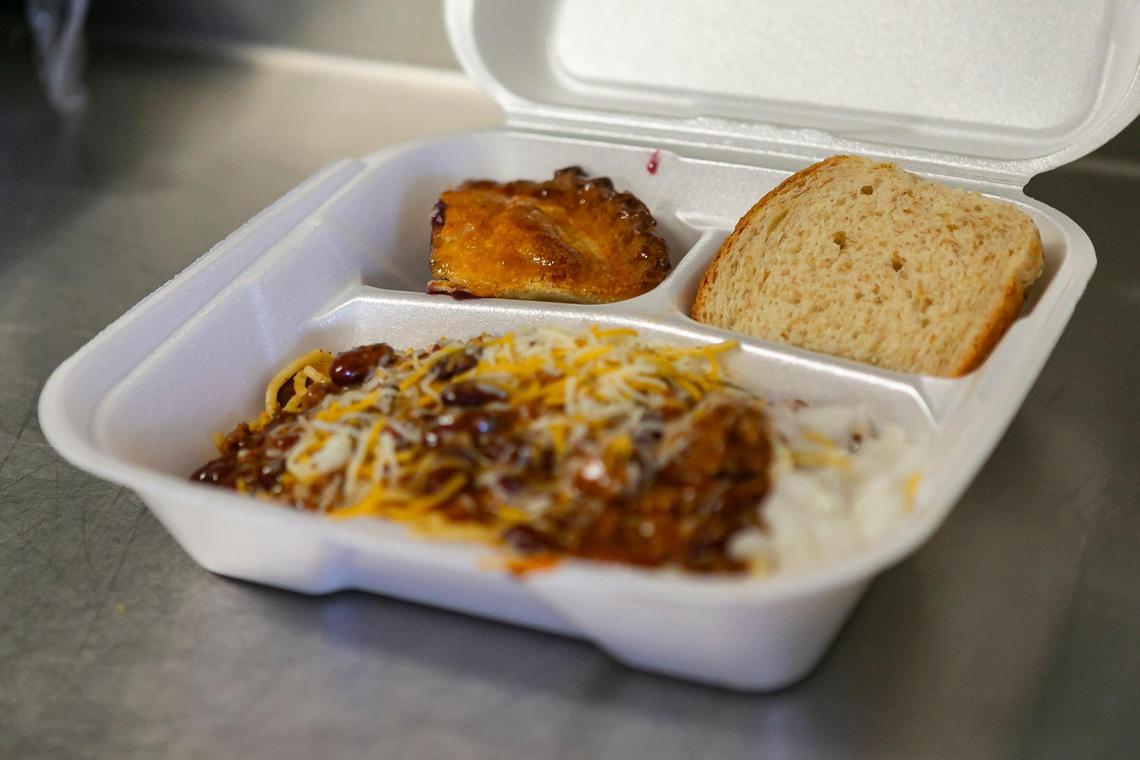 A meal consisting of chili, pasta, pie and bread is distributed at Homestead Soup Kitchen in Homestead, Florida on Friday, June 26, 2020.
