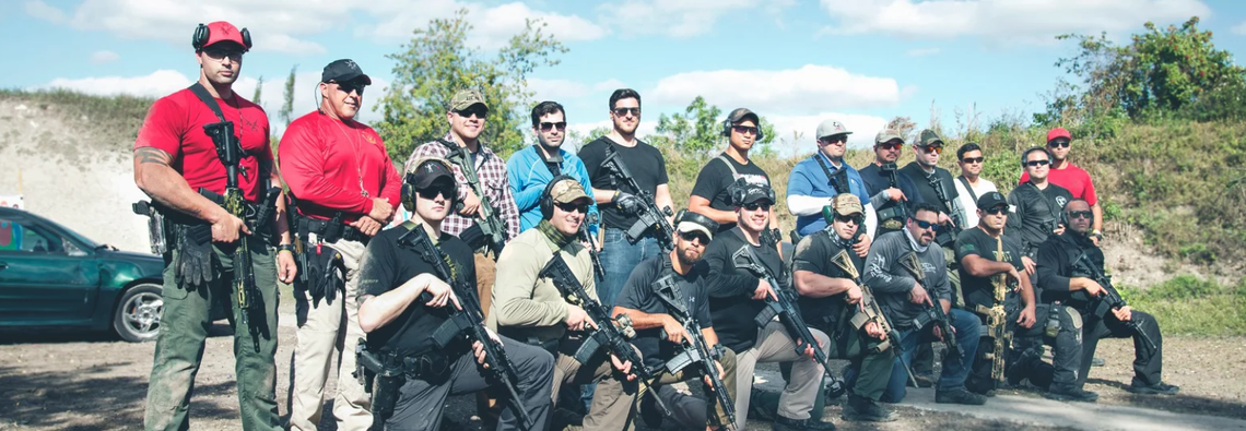A group of trainees poses at Menocal International Training. Jesús ‘Jesse’ Menocal Jr. stands at the far left, with his father Jesús Menocal Sr., a former Sweetwater chief of police, to his right