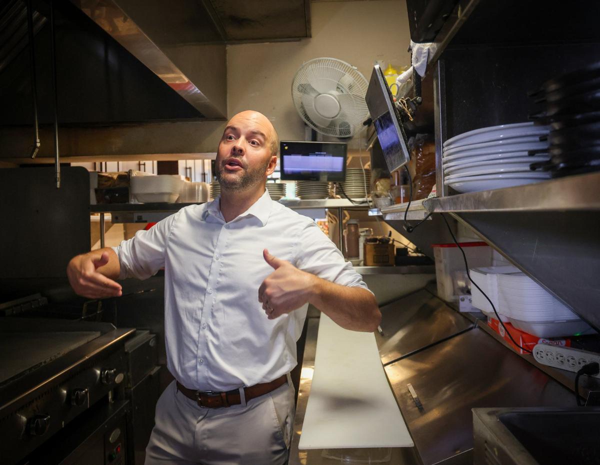 Manny Cid telling a story on Aug. 8, 2024 in the kitchen of his diner in Miami Lakes, where is the mayor. He’s running for Miami-Dade mayor, and critics say his tax-cut plan is a recipe for trouble in county government.