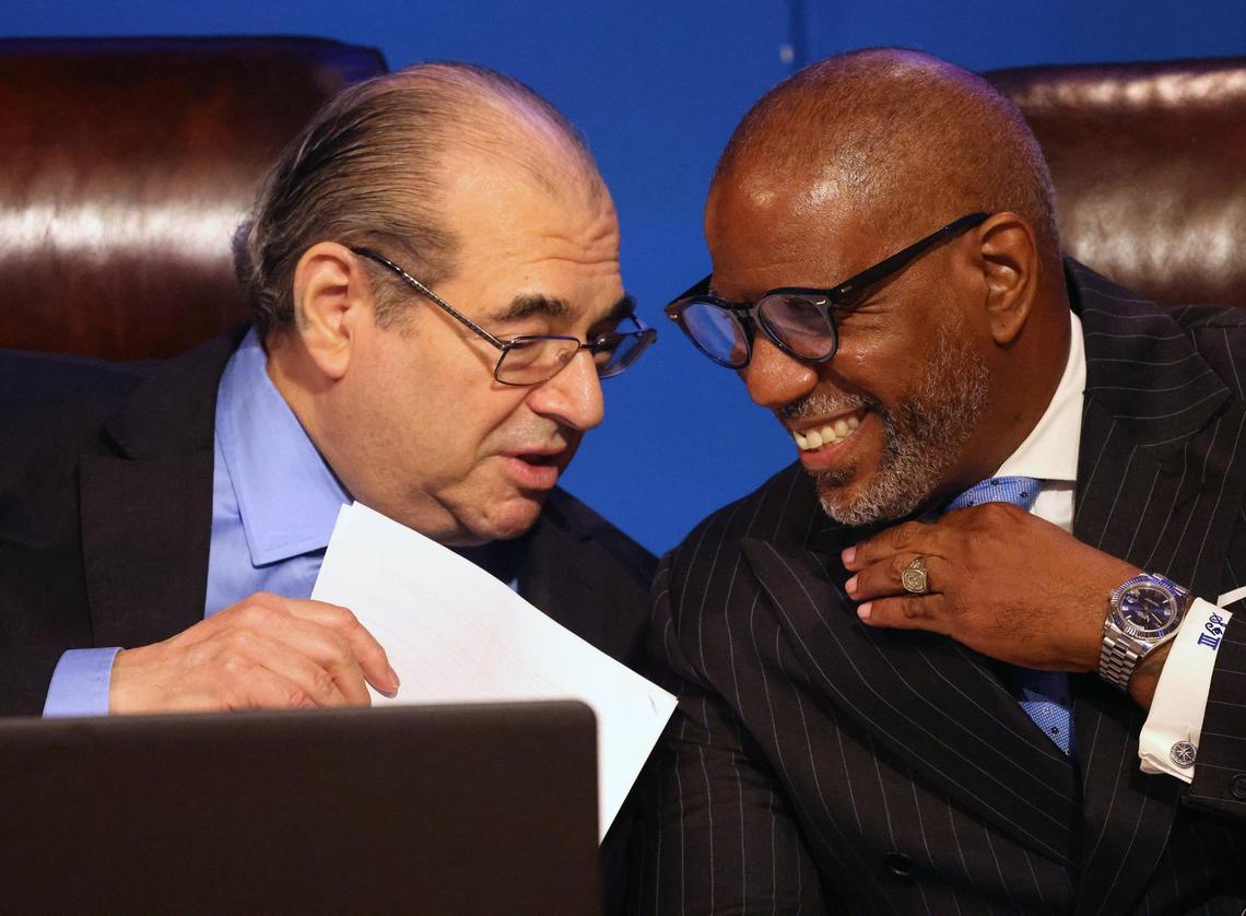 Newly elected Jospeh S. Geller shares a moment with Dr. Steve Gallon III, right, after they were sworn-in at the Miami-Dade County Administration Building on Tuesday, November 19, 2024 in Miami, Florida.