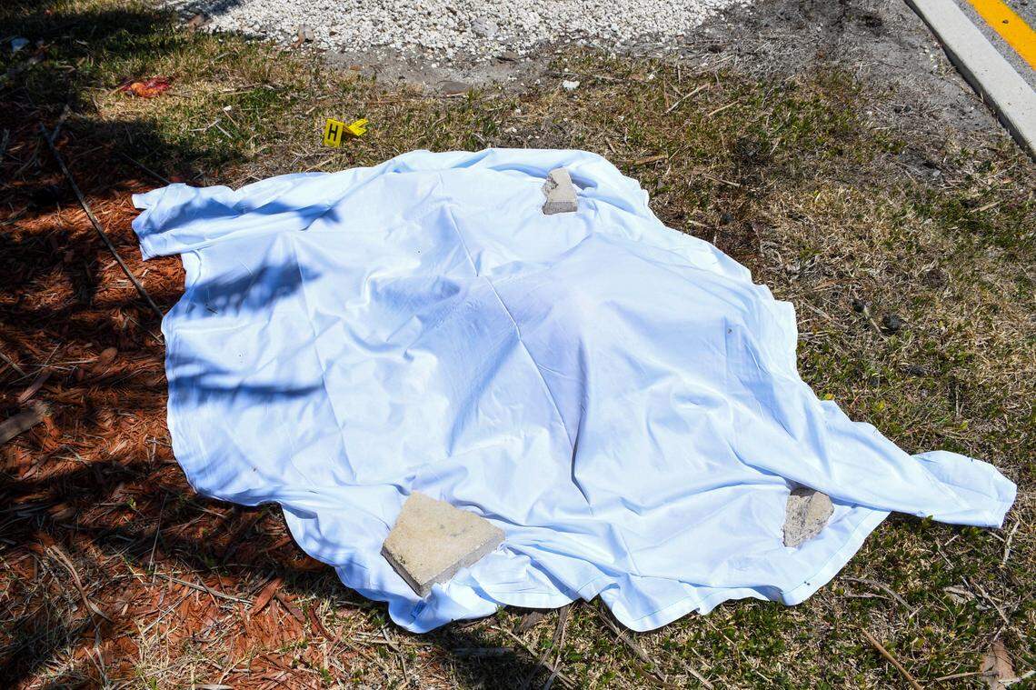 A sheet covers the body of Randy Johanson, the 131st fatality for Brightline. Johanson was disabled and living a simple life after a fall from a roofing job when he was 24 years old. The train was traveling at more than 100 miles an hour when it struck him.