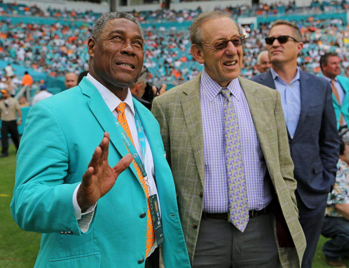 Senior Vice President of Special Projects Alumni Relations and Miami Dolphins alumnus Nat Moore stands with Dolphins owner Stephen Ross during the Dolphins game against the visiting Los Angeles Chargers Sept. 29, 2019.