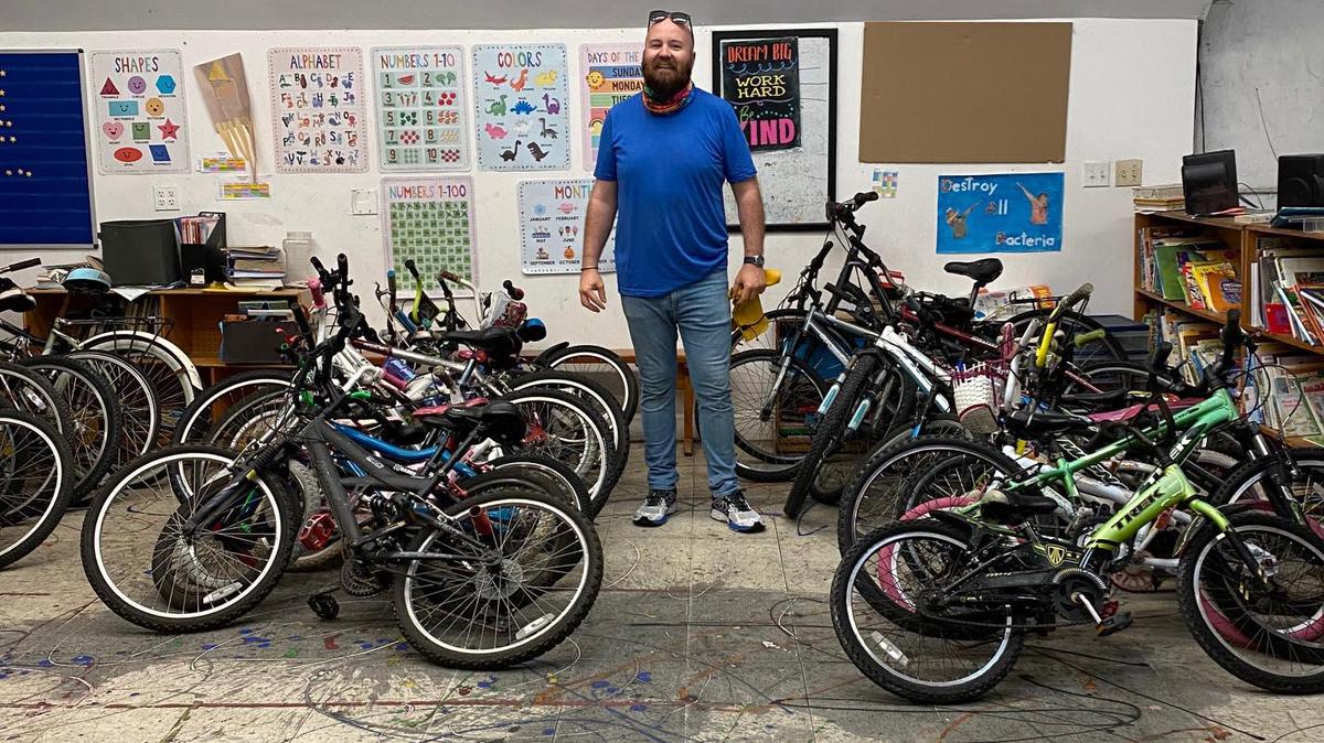 Rotary Club of Coconut Grove Member James Willoughby helped collect donated bikes for children involved in The Barnyard Community Center’s after-school and summer programs.