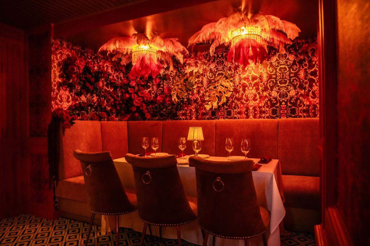 An intimate table at the new J’Adore restaurant and cabaret in Miami Beach.