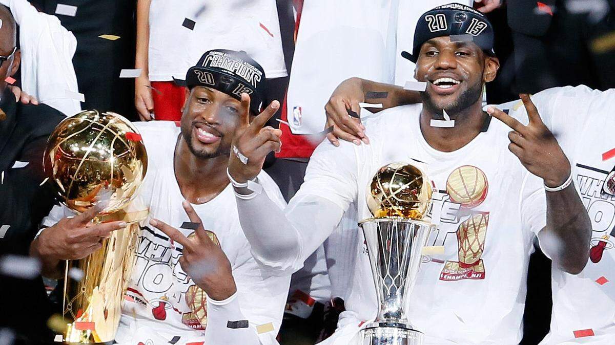 Dwyane Wade, left, and LeBron James celebrate after defeating the San Antonio Spurs 95-88 in Game Seven of the 2013 NBA Finals at AmericanAirlines Arena in Miami.