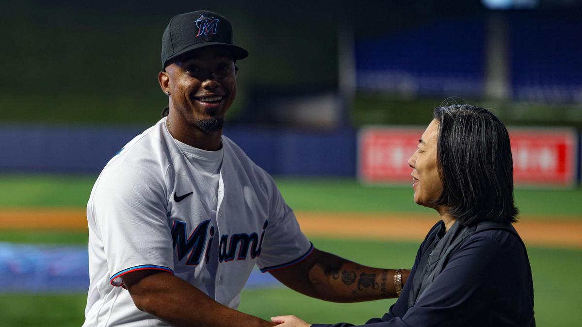 Jean Segura, new Miami Marlins infielder, left, shakes hands with Kim Ng, Marlins General Manager, after welcoming him to the team on Wednesday, Jan. 11, 2023, at loanDepot Park.