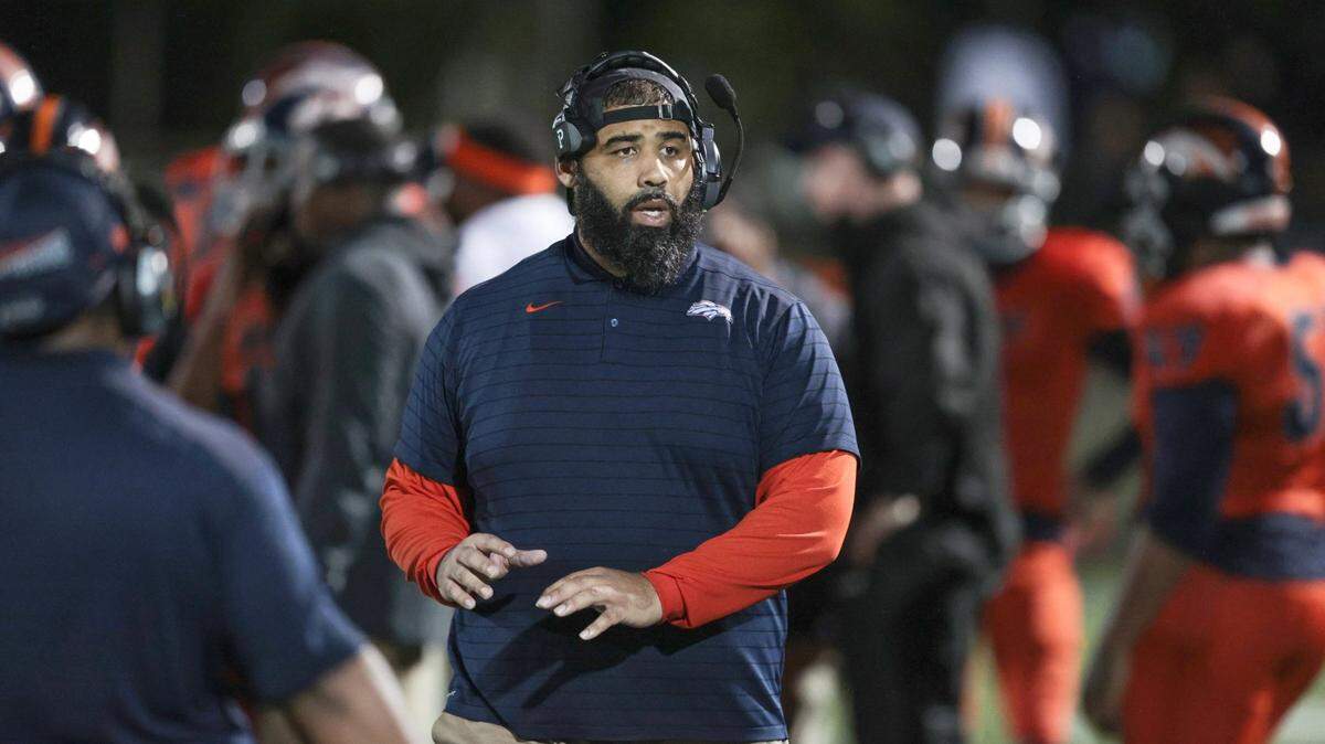 Homestead Broncos coach Philip Simpson on the sidelines during game against Dillard High at Orange Bowl Field at Harris Field Park in Homestead on Friday, November 19, 2021