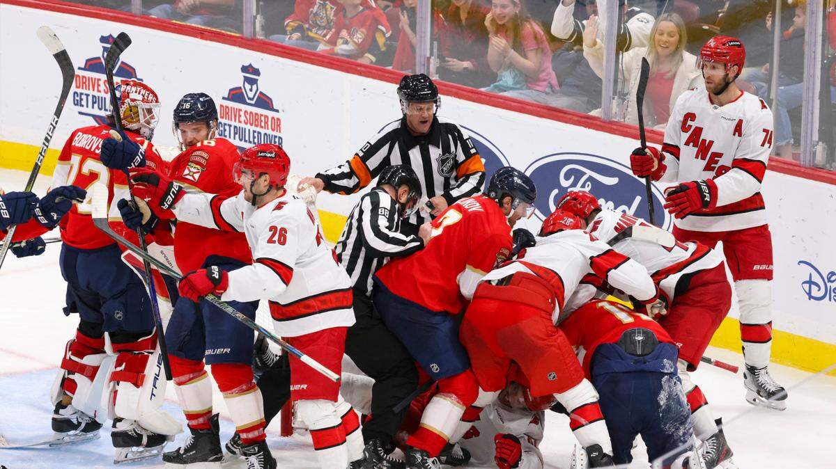 The Florida Panthers and the Carolina Hurricanes get into a fight during the third period of a game on Thursday, Jan. 2, 2025, at Amerant Bank Arena in Sunrise, Fla.