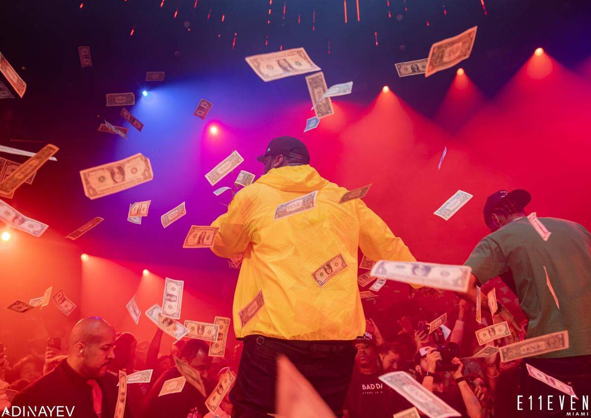 During the Bitcoin conference in 2021, someone at E11EVEN brought $500,000 worth of singles to throw in the air while 50 Cent was performing. The singles were brought out in a bathtub/ADINAYEV