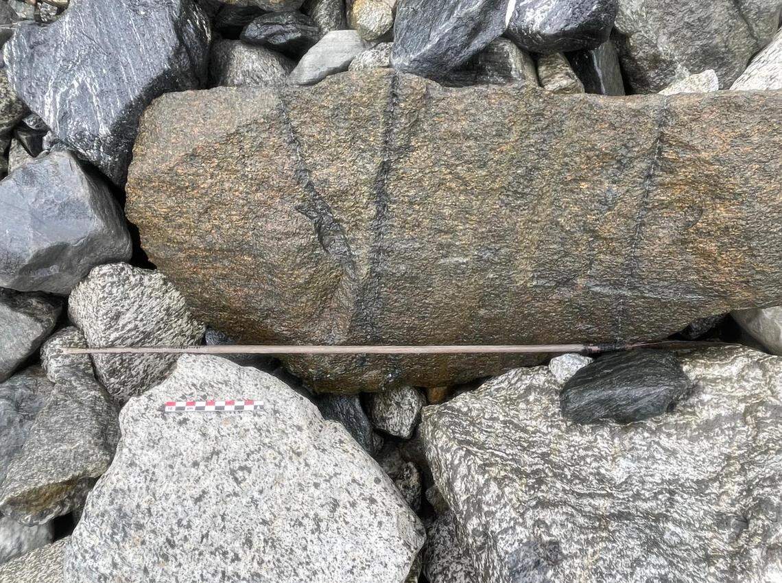 The 1,500-year-old arrow as it was discovered from melting glaciers in the Jotunheimen Mountains in Innlandet County, Norway.