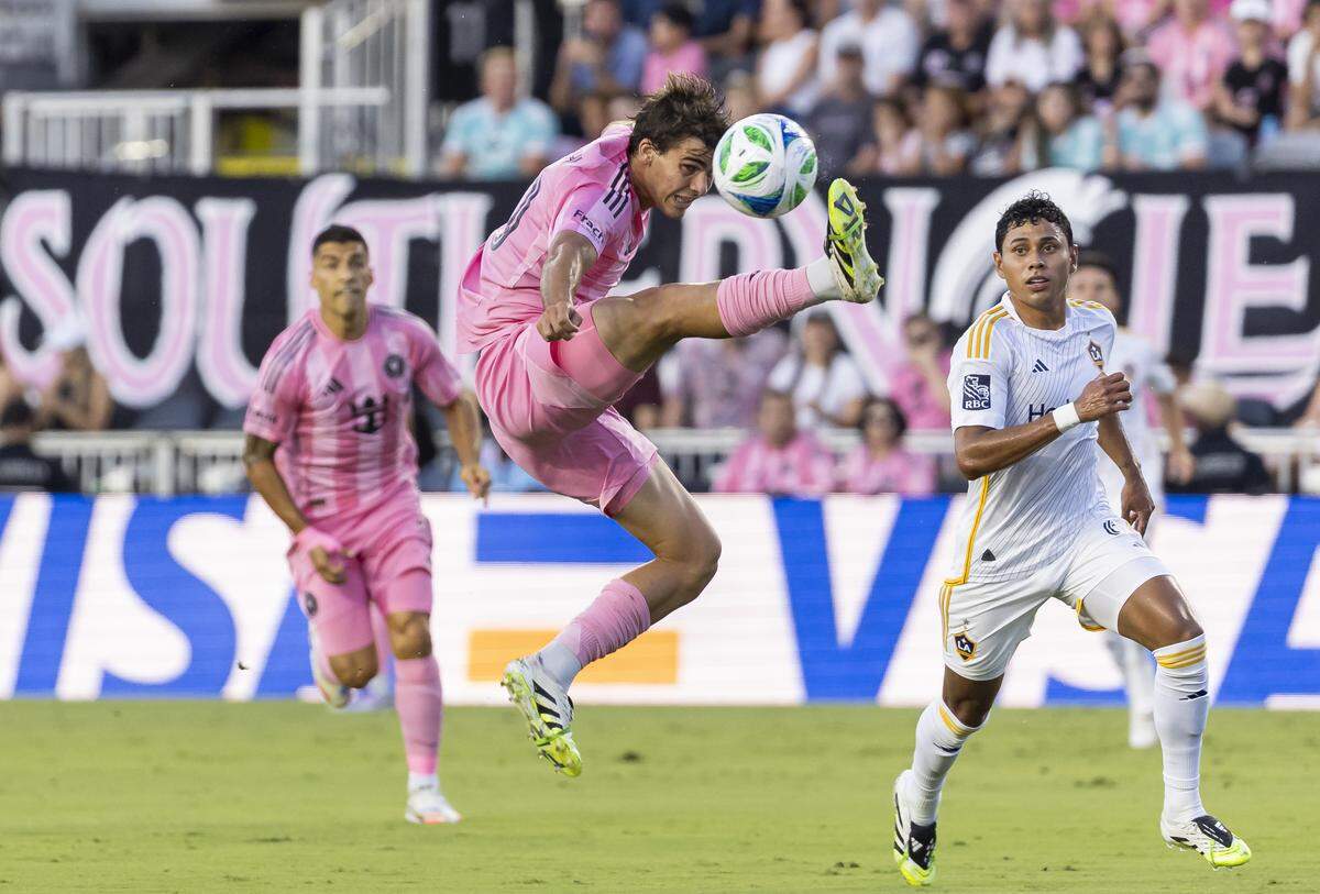 Inter Miami midfielder Benjamin Cremaschi (30) tries to control the ball as Los Angeles Galaxy midfielder Edwin Cerrillo (6) defendsin the first half of their MLS match at Chase Stadium on Saturday, Aug. 16, 2025, in Fort Lauderdale, Fla.