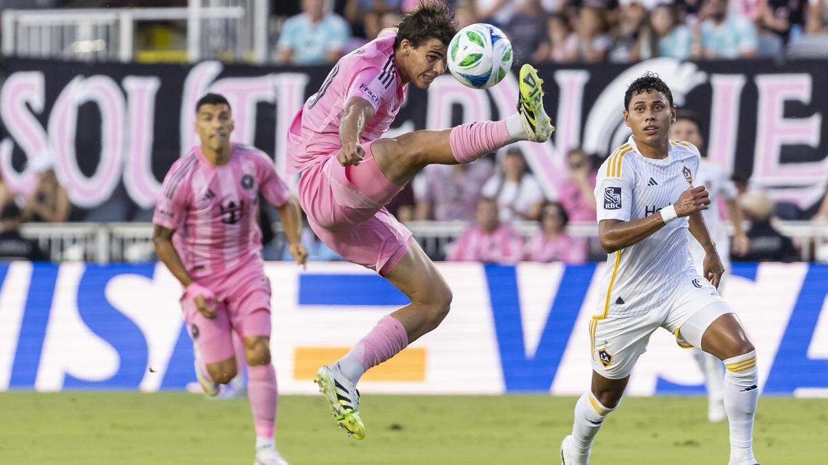 Inter Miami midfielder Benjamin Cremaschi (30) tries to control the ball as Los Angeles Galaxy midfielder Edwin Cerrillo (6) defendsin the first half of their MLS match at Chase Stadium on Saturday, Aug. 16, 2025, in Fort Lauderdale, Fla.