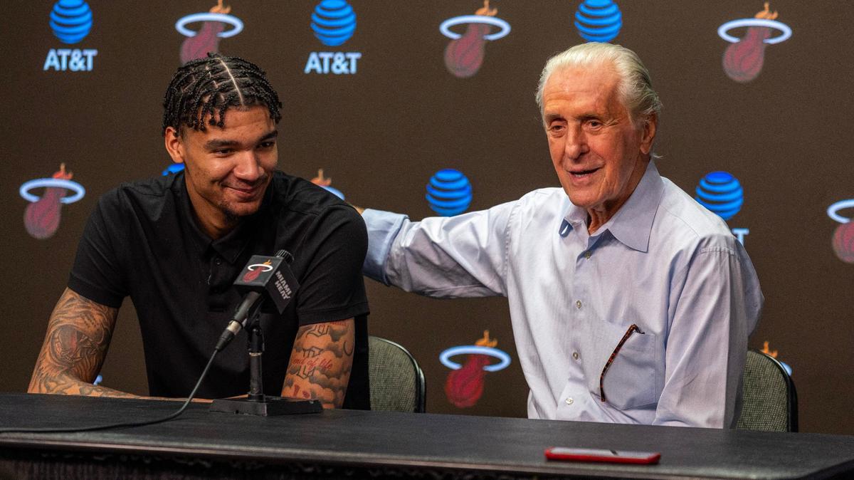 Miami Heat center Kel’el Ware, left, is introduced by Team President Pat Riley, right, during Ware’s first press conference at Kaseya Center on Friday, June 28, 2024, in Miami, Fla.