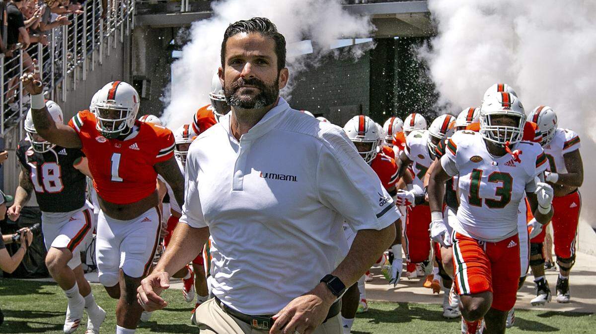 Miami Hurricanes head coach Manny Diaz leads the team onto the field at the start of the Miami Hurricanes spring game at Camping World Stadium in Orlando on Saturday, April 20, 2019.