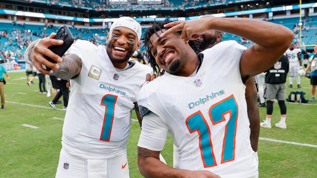 Miami Dolphins quarterback Tua Tagovailoa (1) and wide receiver Jaylen Waddle (17) pose for a selfie after the win against the Las Vegas Raiders of their NFL game in Miami Gardens, Florida on Sunday, November 17, 2024.