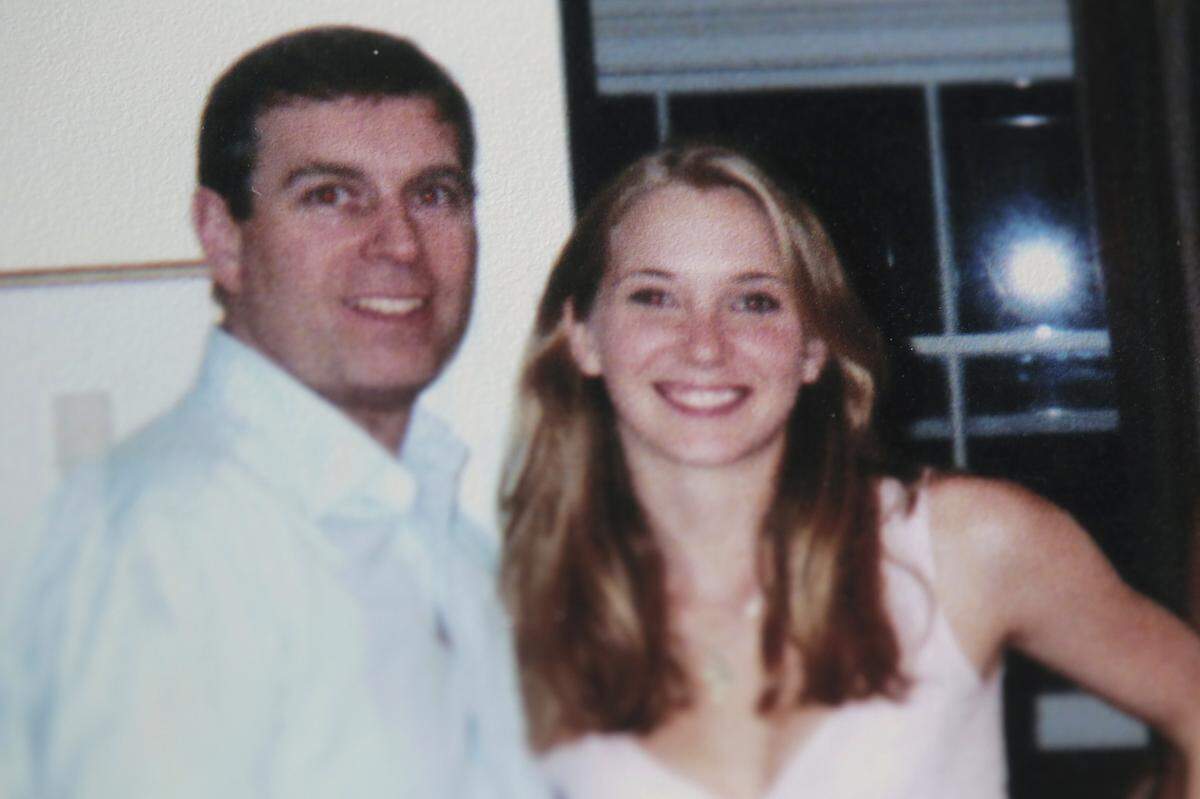 Virginia Roberts poses for a photo with Prince Andrew. Roberts reports that she was lent out to Prince Andrew when she was a teenage sex slave for Palm Beach millionaire Jeffrey Epstein. Roberts says she was used as a sex slave for Jeffrey Epstein for years starting at the age of 16. Roberts says that Epstein regularly lent her out to some of his wealthy, powerful acquaintances for sex.