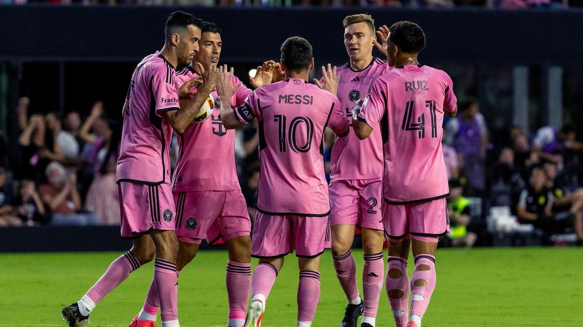 Inter Miami forward Lionel Messi (10) celebrates with teammates after scoring scores a goal in the first half of an MLS match against Nashville SC at Chase Stadium on Saturday, April 20, 2024, in Fort Lauderdale, Fla.