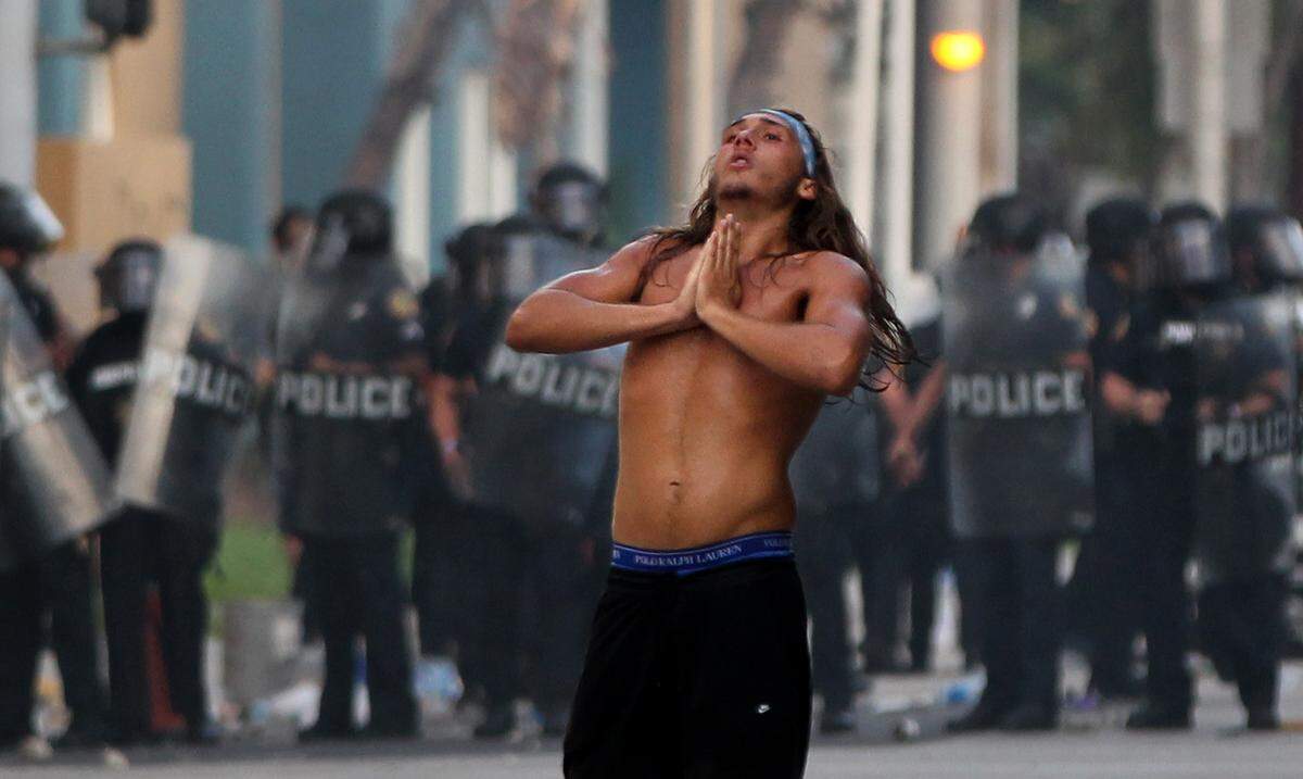 Miami residents take part in a protest on Saturday, May 30, 2020, to denounce George Floyd’s death.