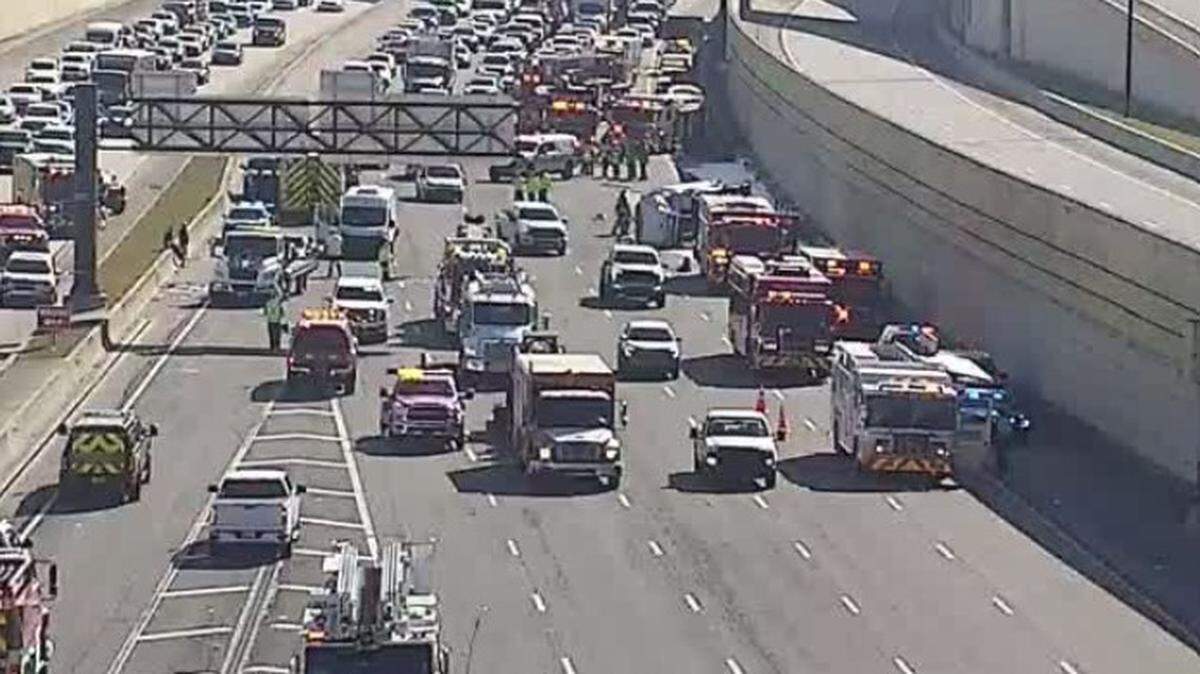 Emergency vehicles block the westbound lanes of Interstate 595 in Davie Wednesday morning, Feb. 11, 2026.