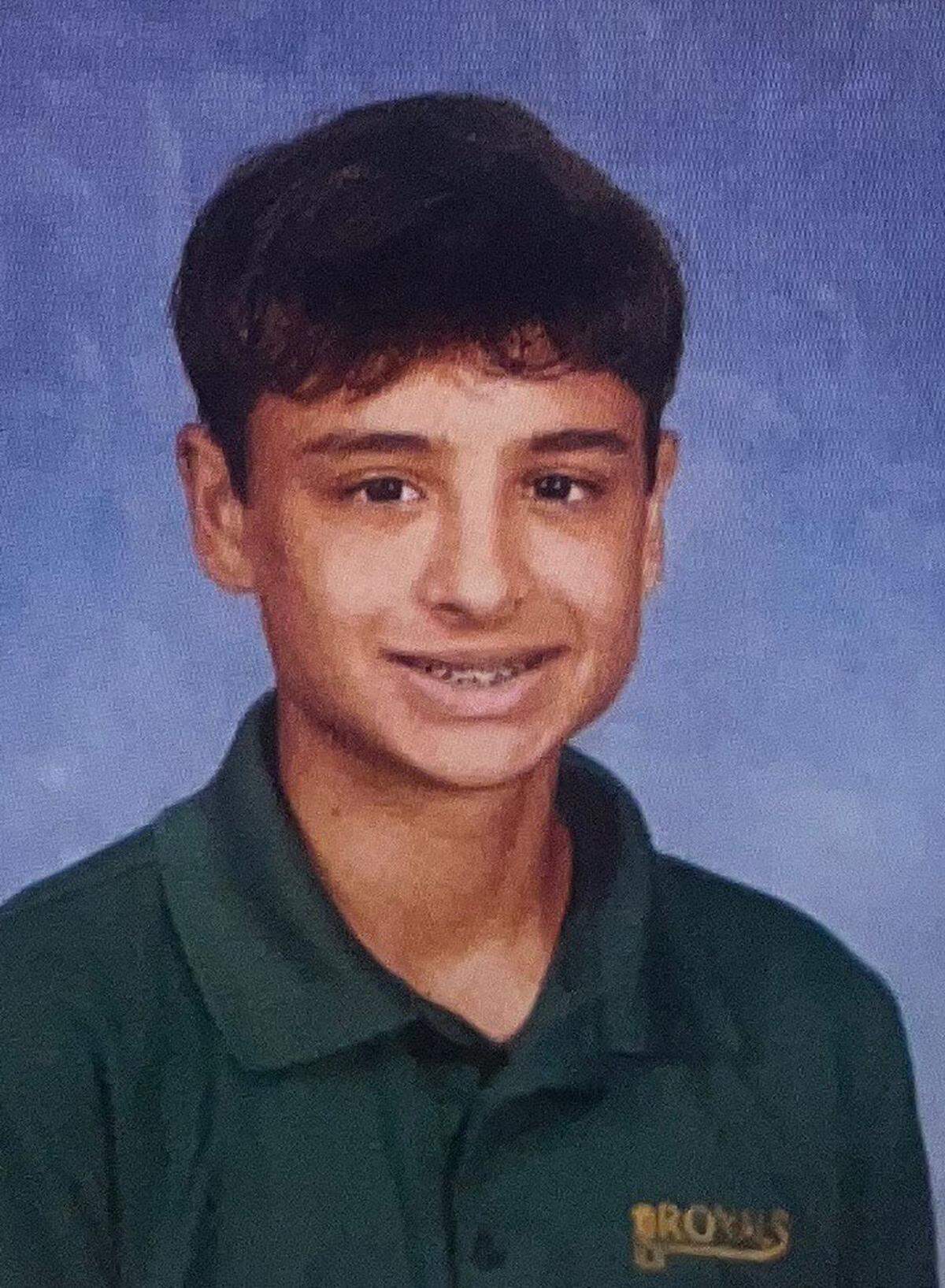 Dominic Ferrell smiles for his sophomore yearbook photo at Immaculata-La Salle High School In Coconut Grove.