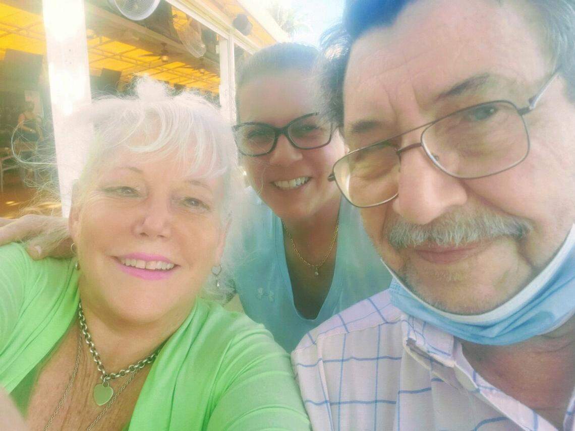 Raysa Rodriguez, middle, who lived in Champlain Towers South unit 907, with two of her closest friends from the condo, Elaine Sabino and Richard Augustine, who both died in the collapse.