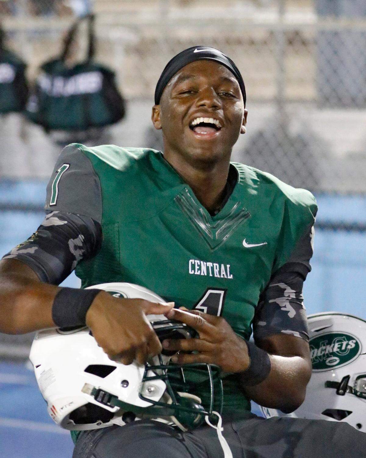 Miami Central Rockets quarterback Keyone Jenkins (1) smiles during Class 2M state semifinal game against St. Petersburg Lakewood Spartans on Friday, December 2, 2022 at Traz Powell Stadium in Miami. Andrew Uloza / for Miami Herald