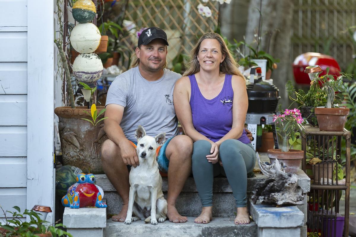 Brian Eversole, 41, his girlfriend, Jocelyn Burdick, 41, and their dog, Kaimana, live in a 400-square-foot home in Key West, Florida.