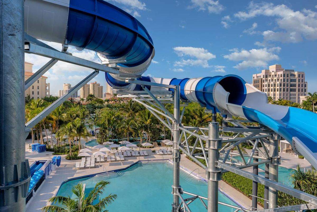 Ride the slides at Aventura’s Tidal Cove Waterpark.