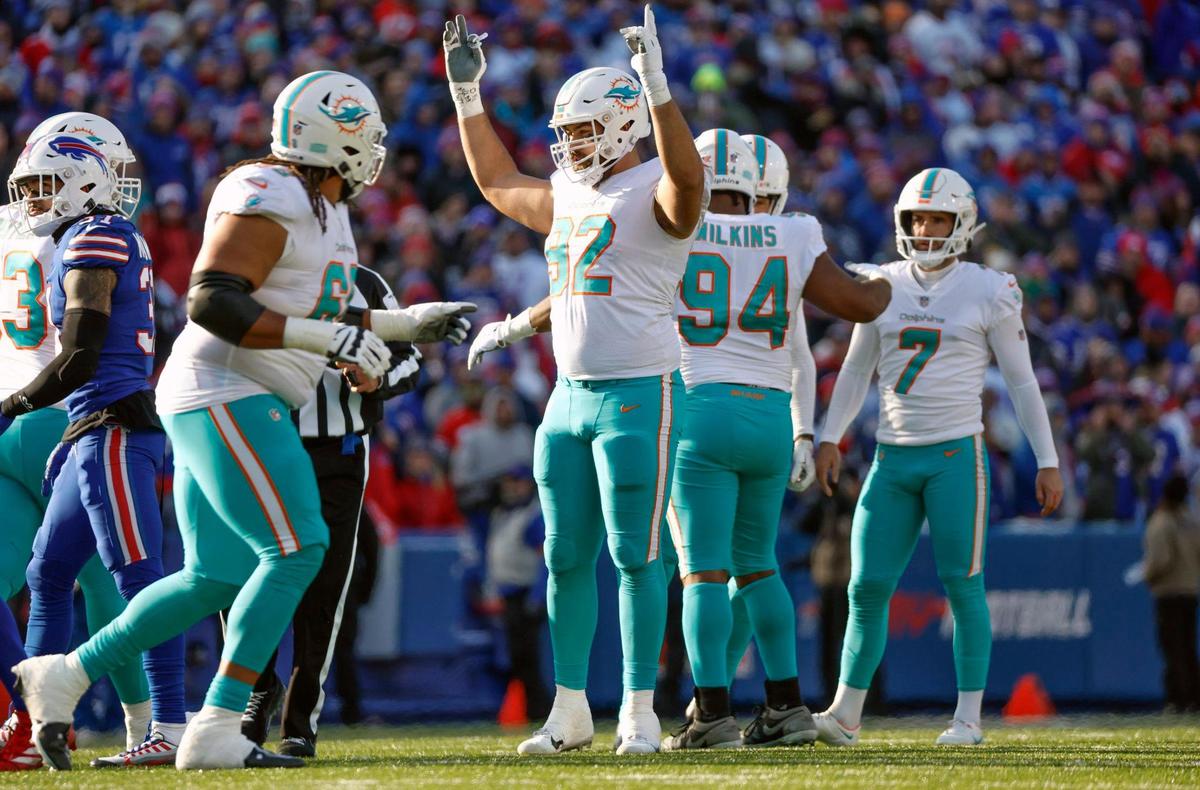 Miami Dolphins defensive tackle Zach Sieler (92) reacts after place kicker Jason Sanders (7) scores in the second quarter against the Buffalo Bills during the NFL wild-card football game at Highmark Stadium, Orchard Park, NY, on Sunday, January 15, 2023.