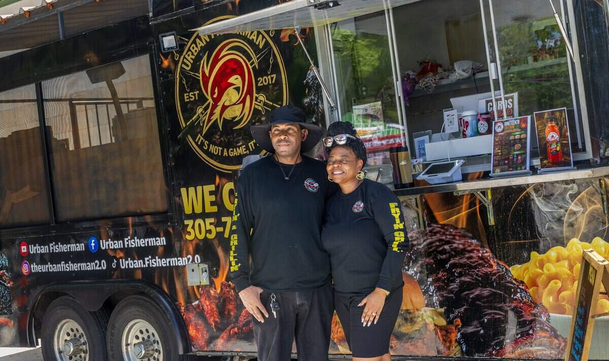 Long time Coconut Grove residents Tiffany and Freddie Bell, owners of the Urban Fisherman food truck posed for a picture during the 3rd Annual Juneteenth Freedom Day Emancipation celebration at the Elizabeth Virrick Park, that featured live music, cultural performances, storytelling, and community fellowship, on Friday June 19, 2026.